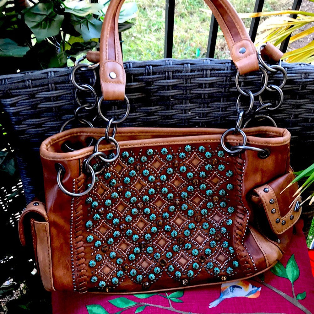 Like Brand New Leather Purse even has a place for your pistol made Montana  West